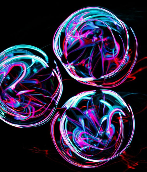 Abstract neon circles representing energy flow and movement balance